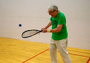 Man playing racquetball.