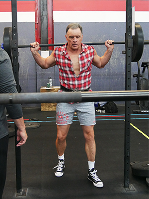 Man lifting weights.
