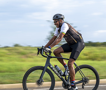 Man riding bicycle.